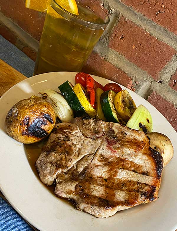 Pork chop with grilled veggies